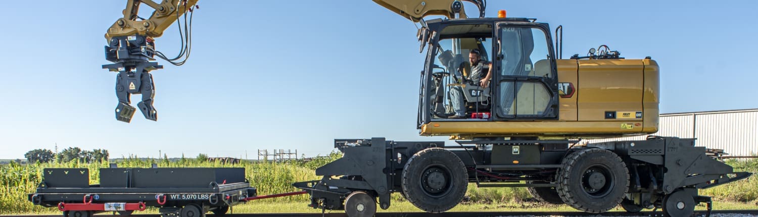 Rail Rider Track Maintenance Cart and Tie Handler on Cat M320 on Rail (3)