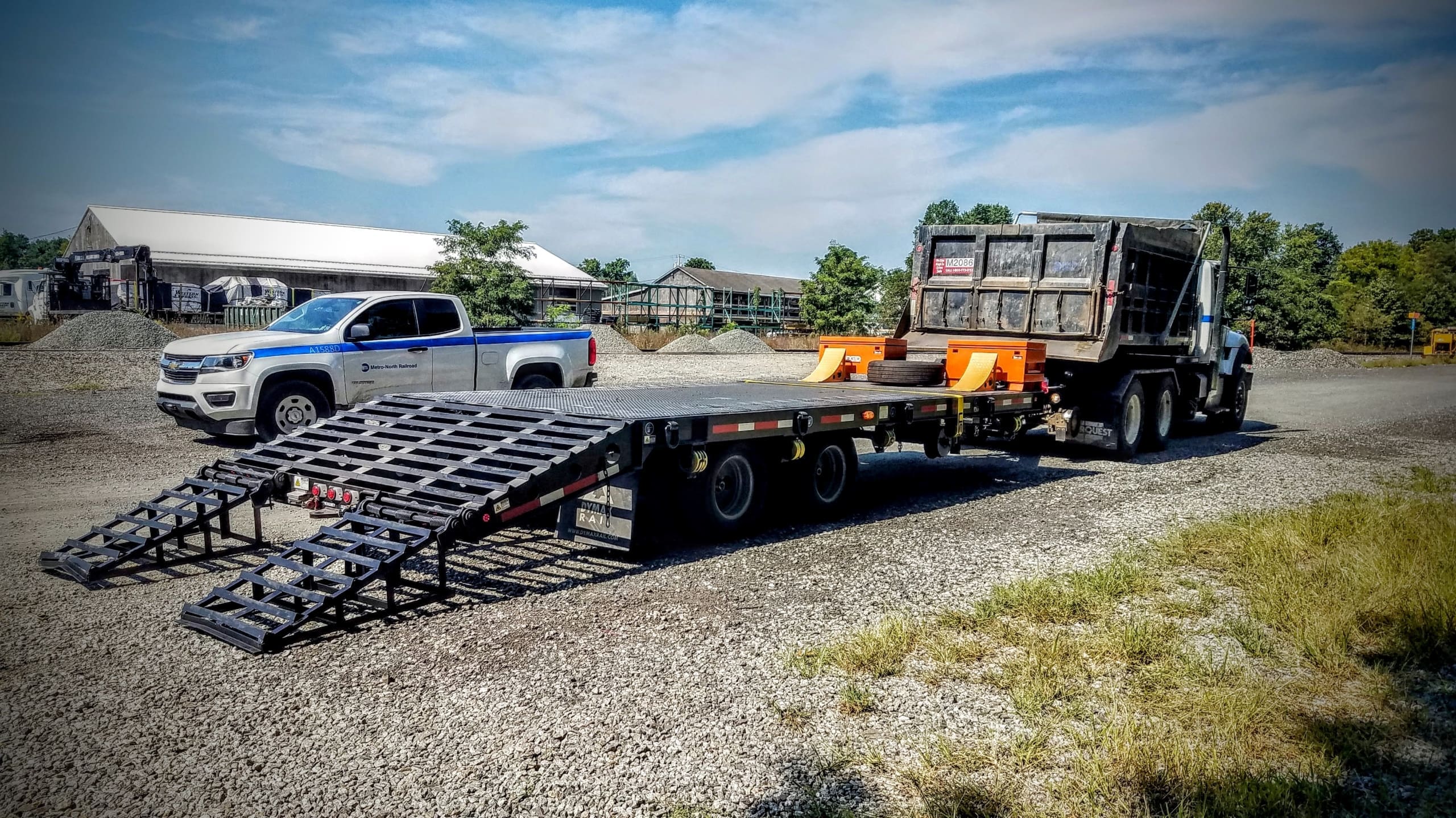 Hi rail trailer with road and rail wheels ready for rail maintenance work