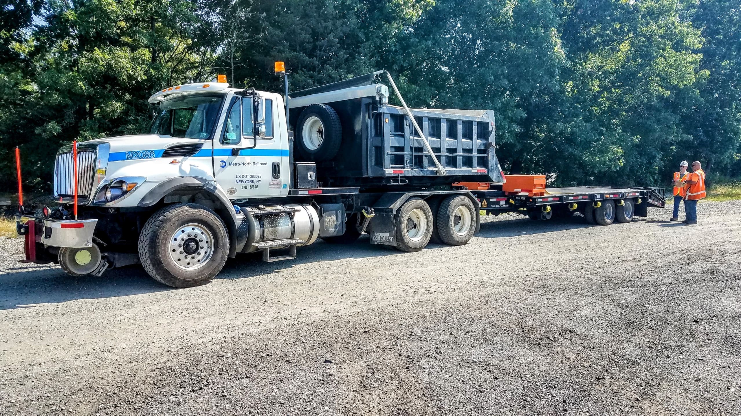 Metro North Transit using a hi rail trailer with road and rail wheels for rail maintenance work