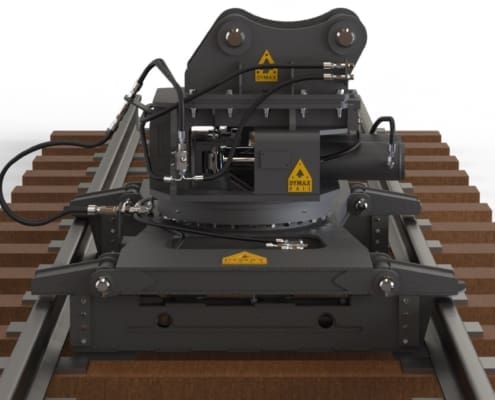 Dymax Track Panel Handler mounts on 25-ton excavator for handling track panel at jobsites