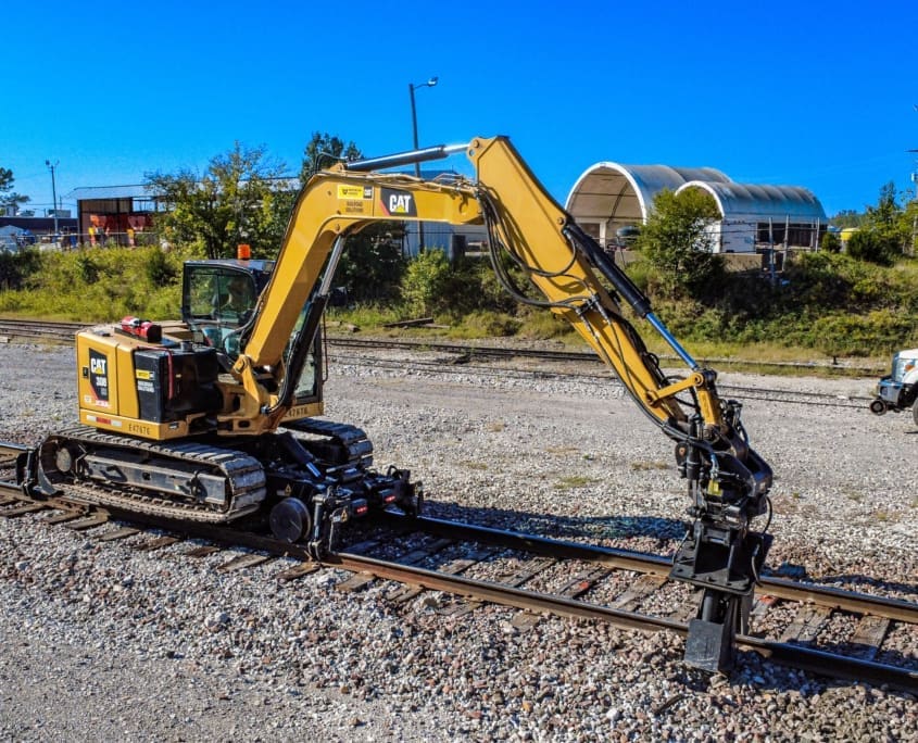 Dymax Rail Rider X2-8T detachable hi-rail attachment for 8-ton track excavators — Cat 308, Deere 85, Komatsu PC88 class