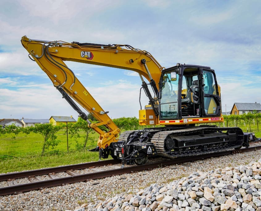 Dymax Rail Rider X2-15T detachable hi-rail attachment for 13-15-ton track excavators — Cat 313/315, Deere 135/145, Komatsu PC138 class